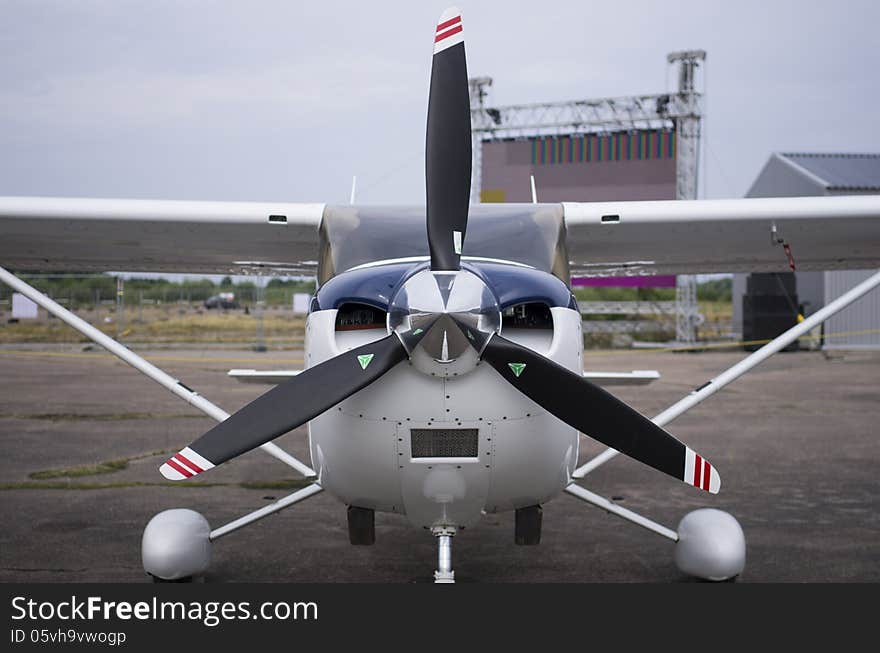 Front part of fuselage of a small light aircraft in full color