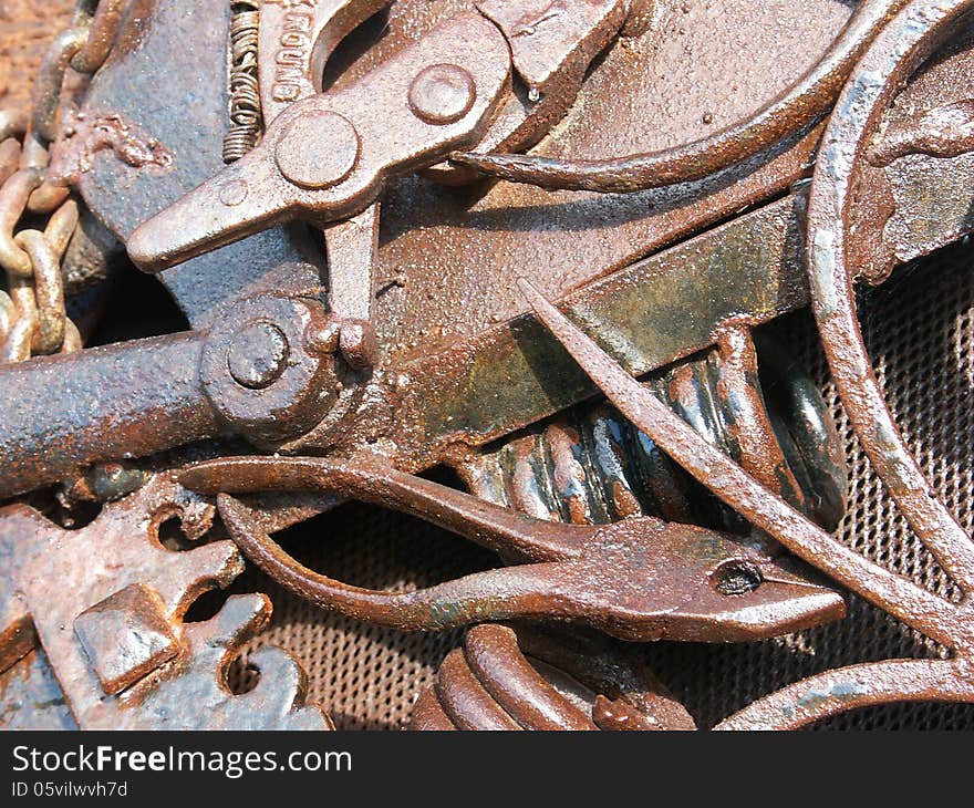 Collection of rusty metal objects and tools welded together. Collection of rusty metal objects and tools welded together