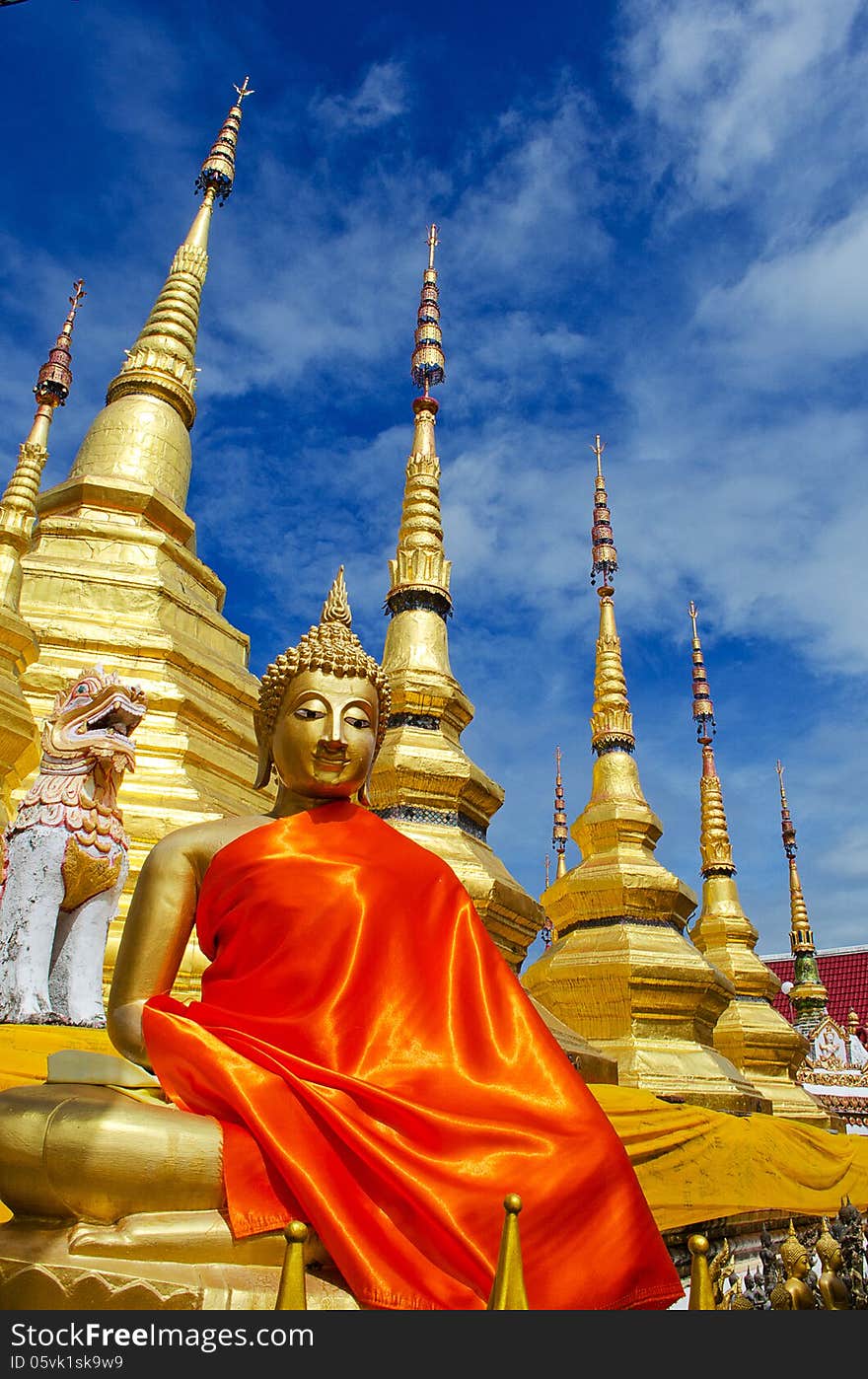 Gloden Seated Buddha Image with Golden Pagoda