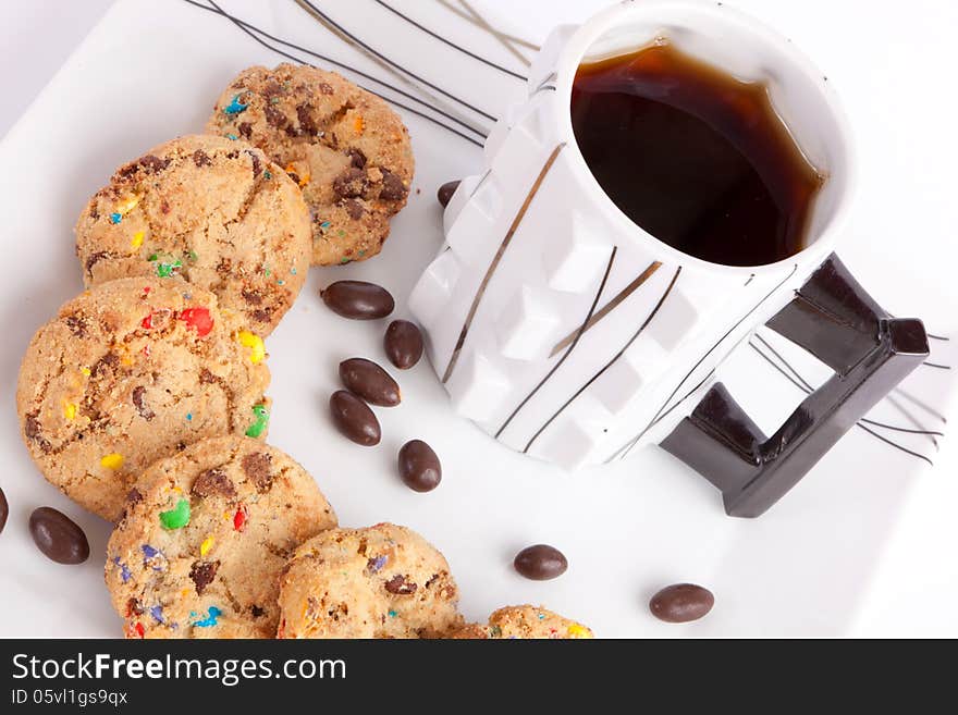 Cookies and chocolate with tea