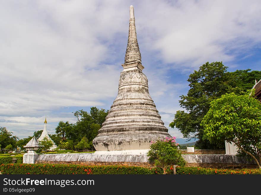 White pagoda in cloudy sky