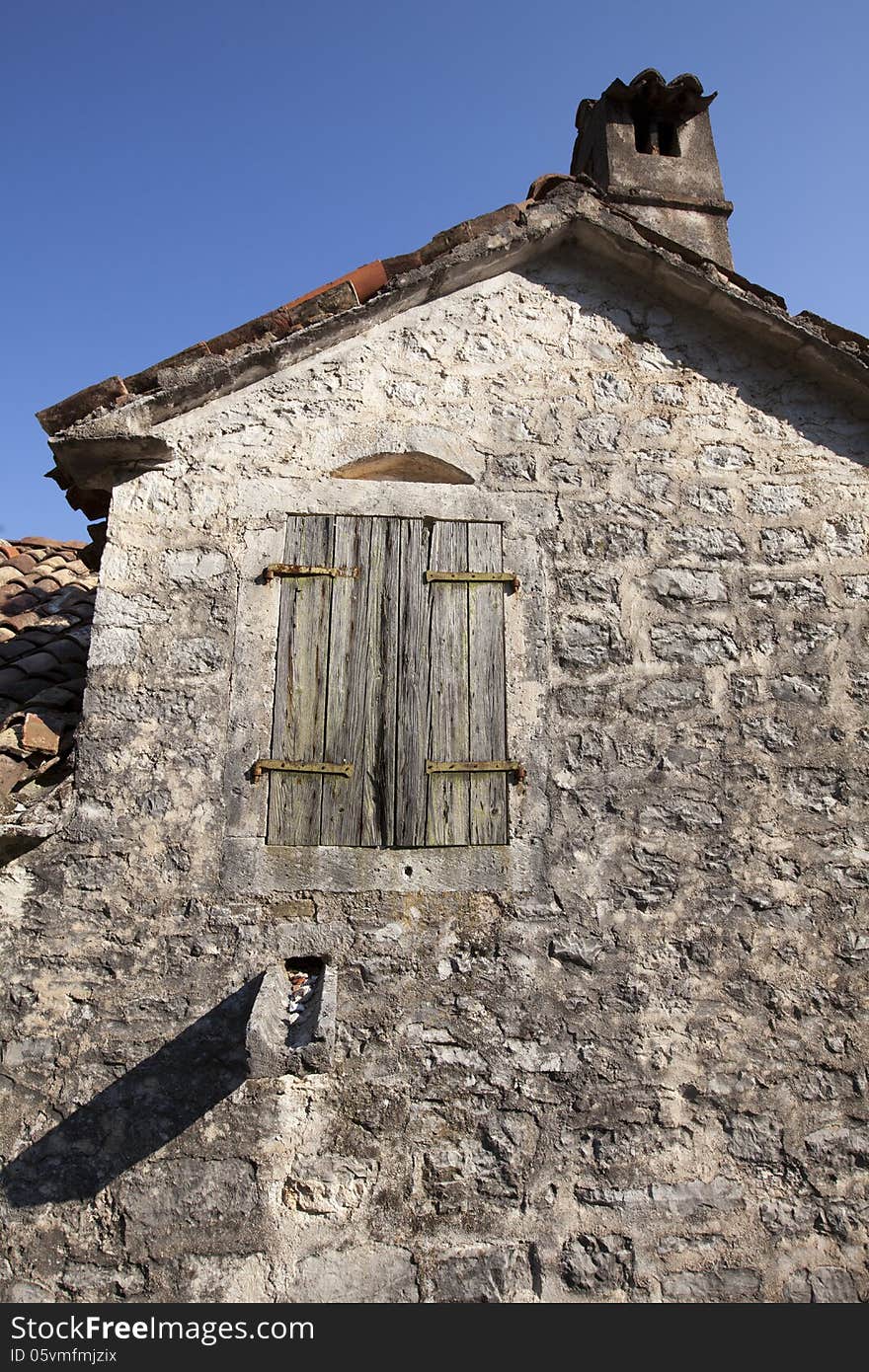 Old stone house with woode windos