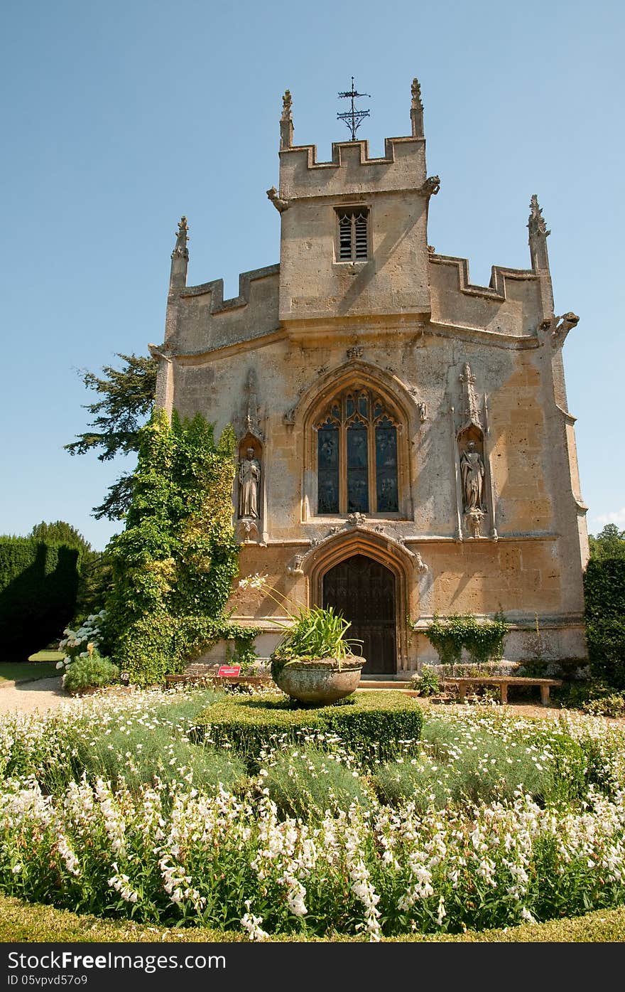 Flowerbed And Church