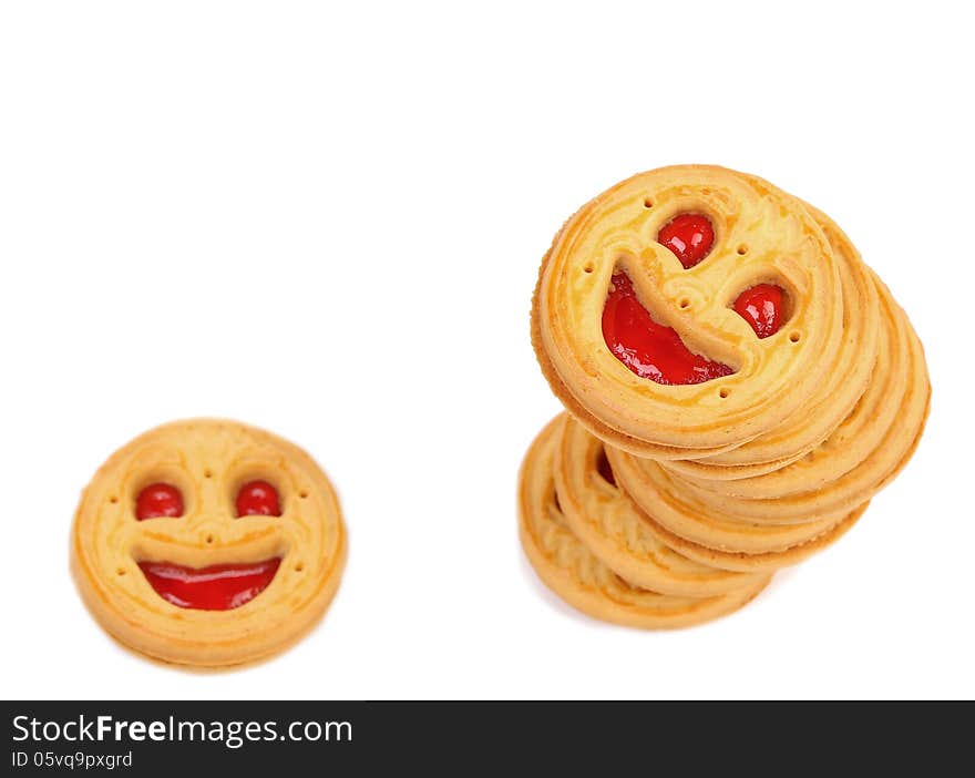 Stack of smile biscuits. Close up. White background.