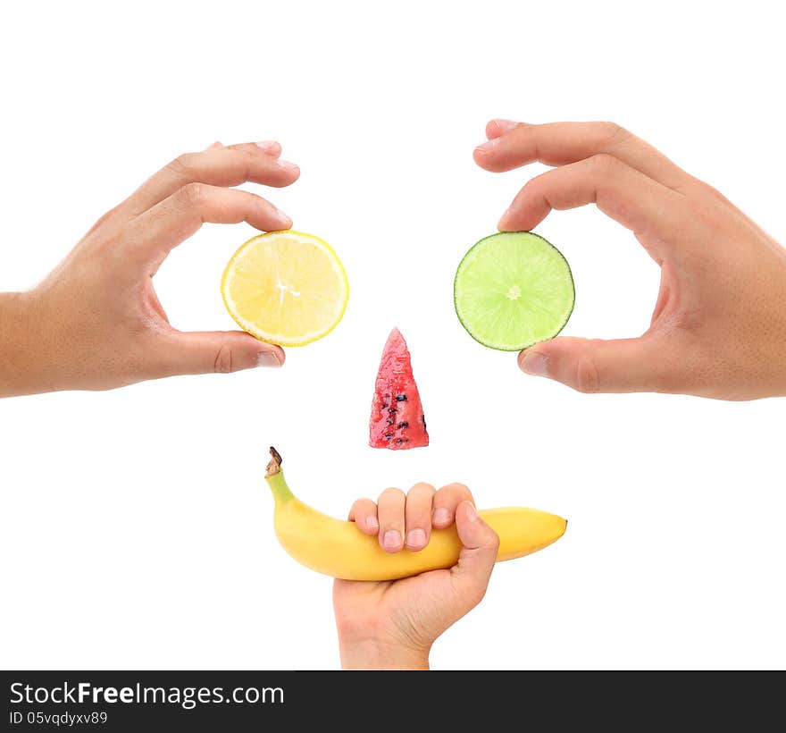 Little face made of fruit.. White background.