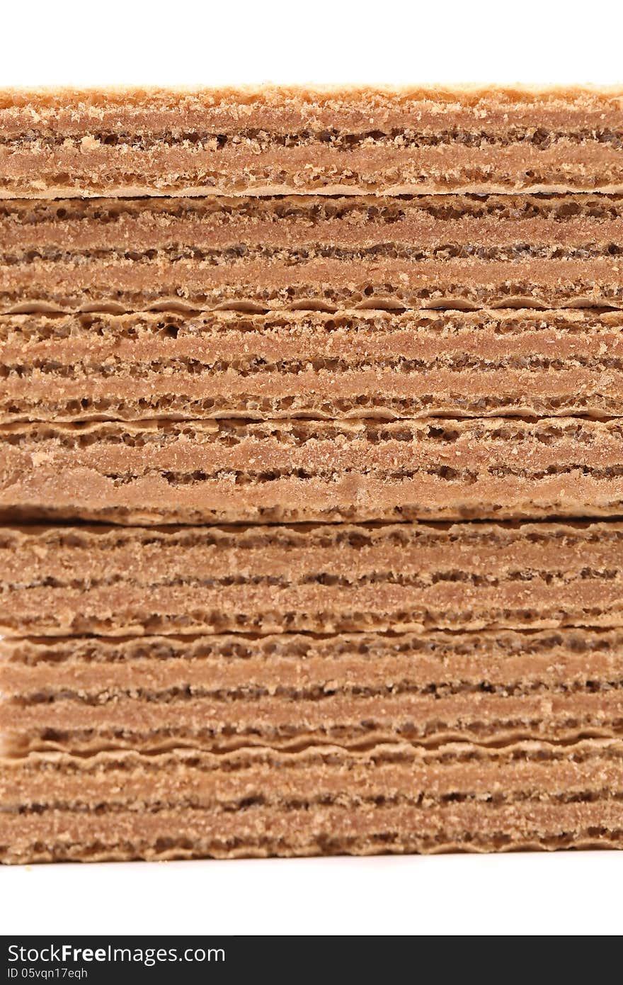 Stake of wafers with chocolate on a white background