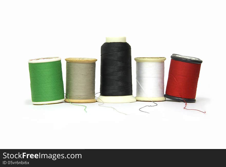 Colored spool thread for sewing and clothing. Colored spool thread for sewing and clothing