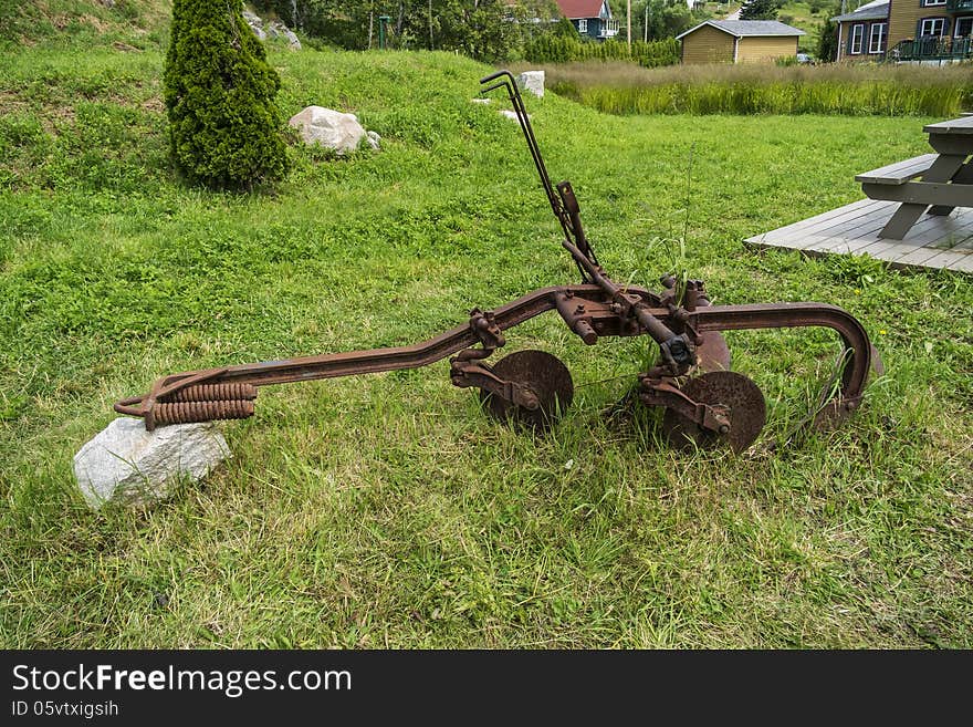 Vintage farm equipment in a provincial park. Vintage farm equipment in a provincial park