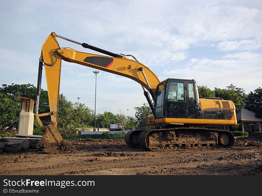 Excavator and backhoe