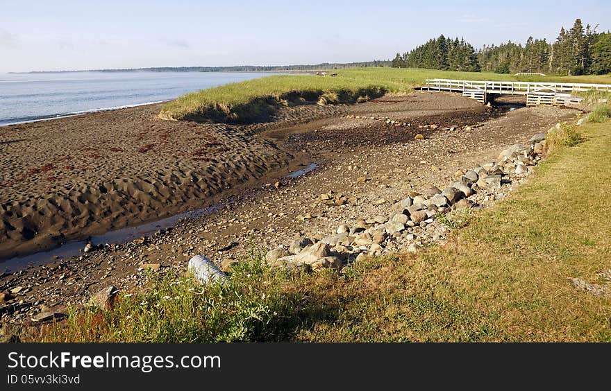 The long sandy beach in Herring Cove Provincial Park is situated on Campobello Island in the Bay of Fundy. The island - accessible from Lubec, Maine via the FDR International Bridge - is part of the province of New Brunswick. The provincial park shares a border with the Roosevelt Campobello International Park, where the Roosevelt family once vacationed. The long sandy beach in Herring Cove Provincial Park is situated on Campobello Island in the Bay of Fundy. The island - accessible from Lubec, Maine via the FDR International Bridge - is part of the province of New Brunswick. The provincial park shares a border with the Roosevelt Campobello International Park, where the Roosevelt family once vacationed.