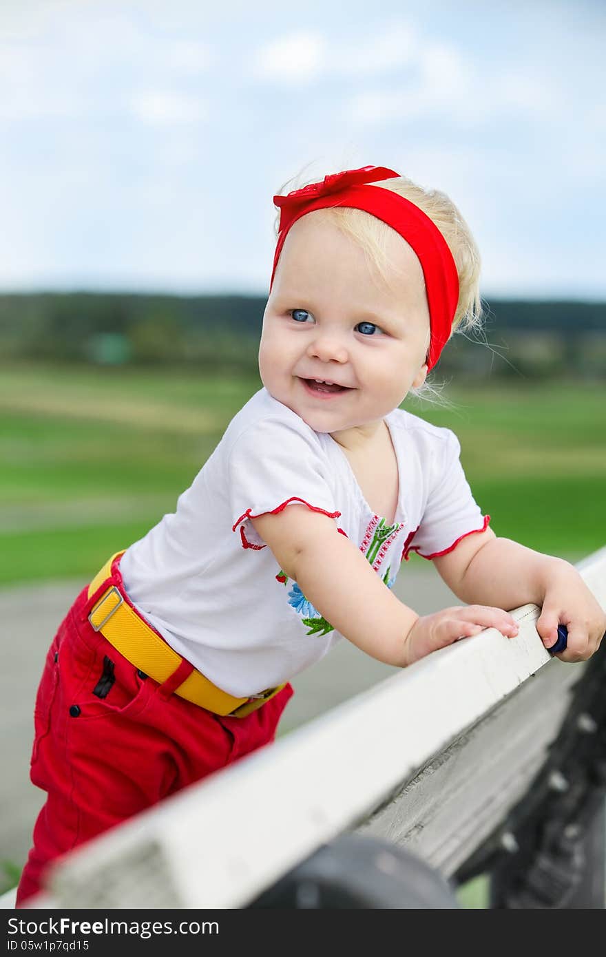 Cute baby girl outdoors