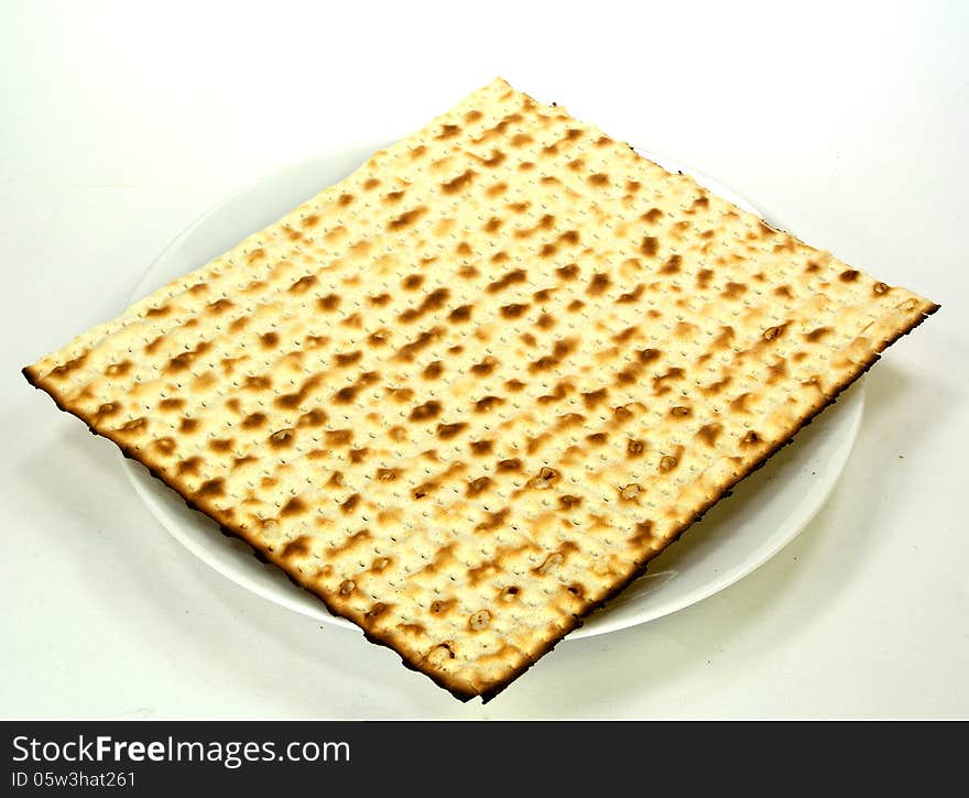 Matzoh on a plate - jewish passover bread. Matzoh on a plate - jewish passover bread