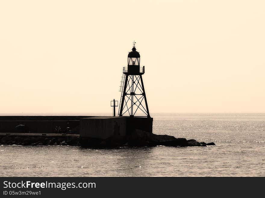 Lighthouse in the breakwater of the port of Alicante. Lighthouse in the breakwater of the port of Alicante