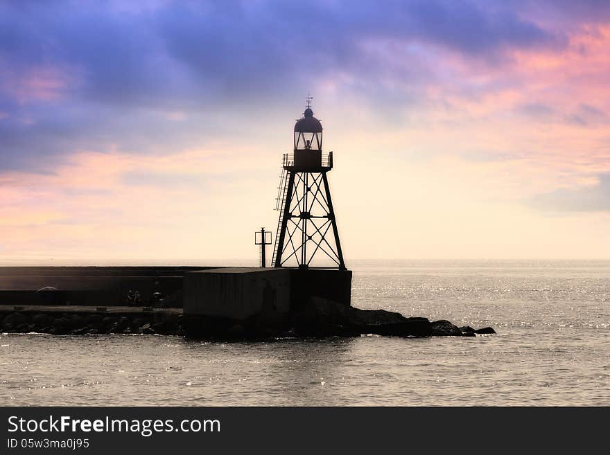 Lighthouse in the breakwater of the port of Alicante. Lighthouse in the breakwater of the port of Alicante