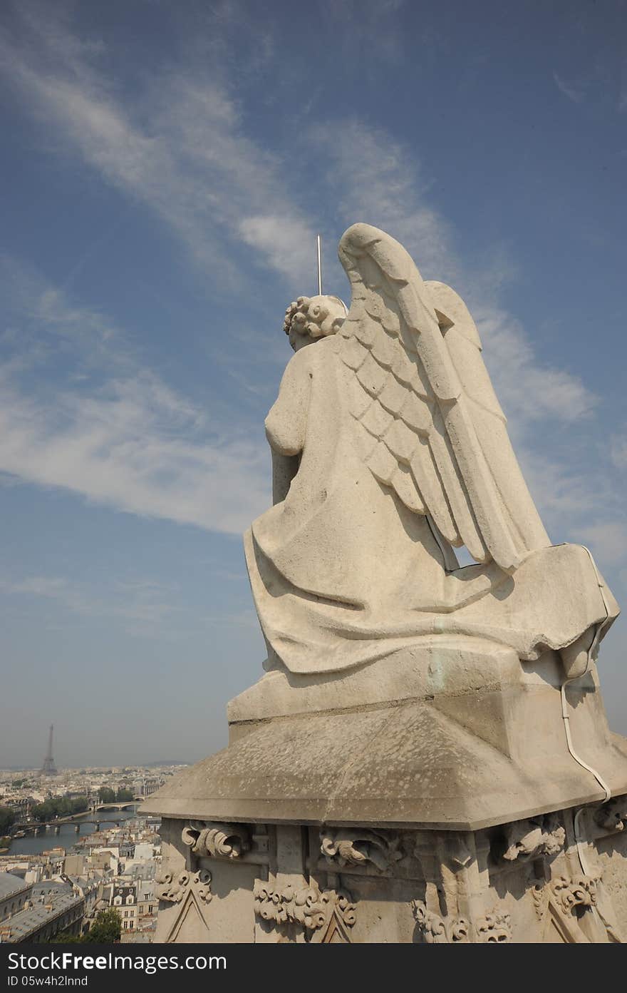 One of the corner statues at the very top of the Tour Saint-Jacques. One of the corner statues at the very top of the Tour Saint-Jacques.