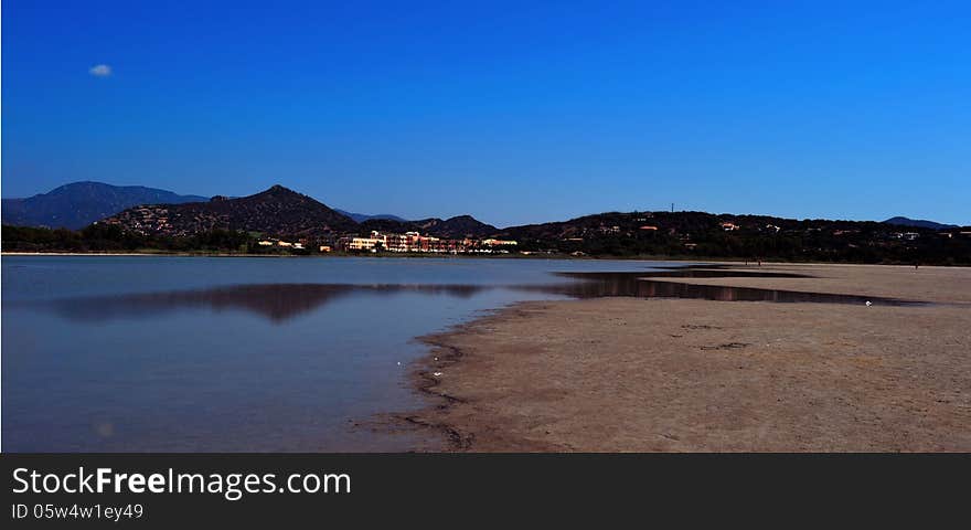 Peaceful twilight and reflection in the water (Sardinia in Italy). Peaceful twilight and reflection in the water (Sardinia in Italy)