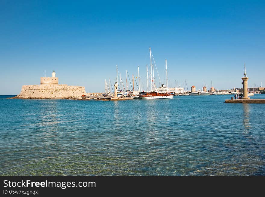 Mandraki harbor and the old lighthouse.