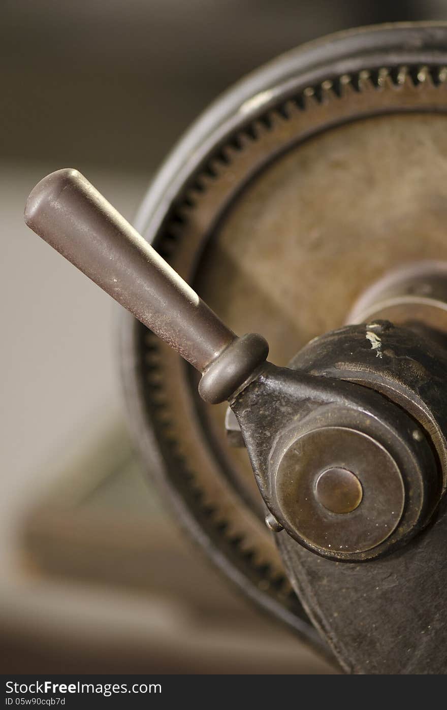 An rusted iron gear of an antiquated steam machine. An rusted iron gear of an antiquated steam machine