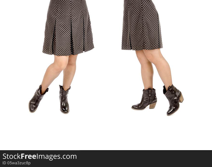 Woman Wearing Polka Dot Mini Skirt and Black Leather Cowboy Boots