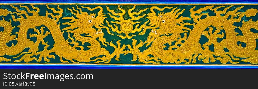 Couple of golden dragons paiting in chinese temple