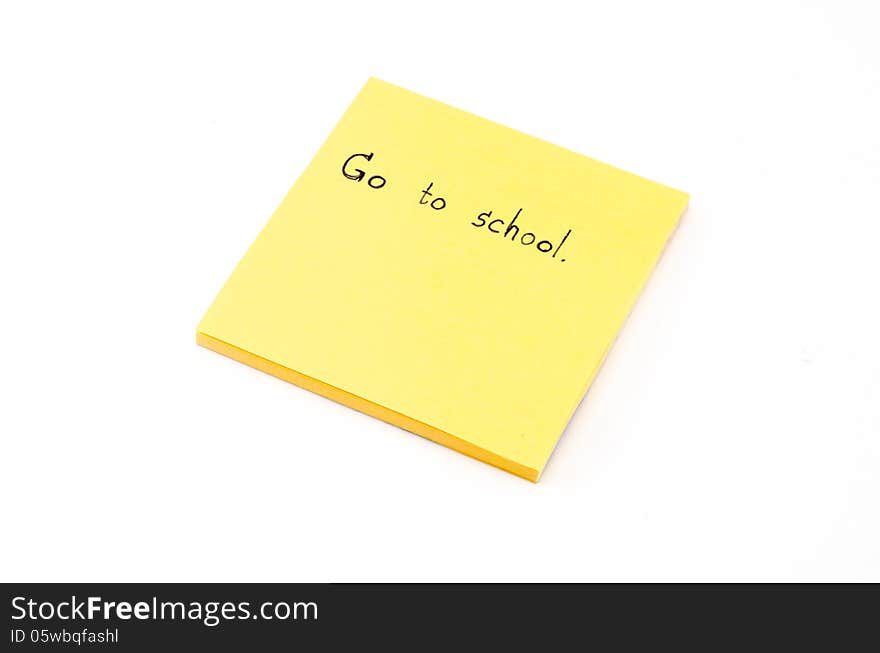 Go to school word on orange post it isolated on white background