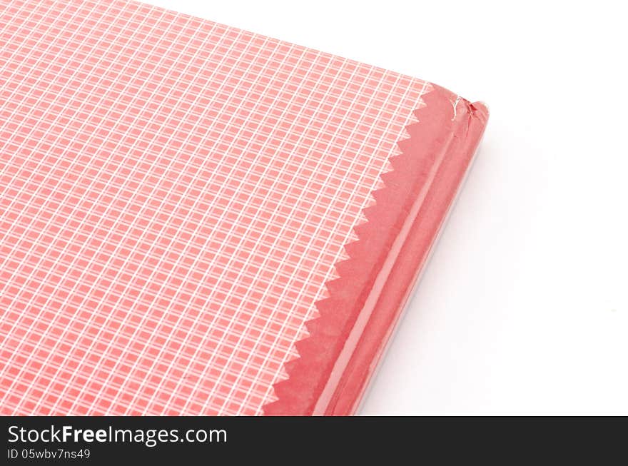 Red notebook isolated on white background