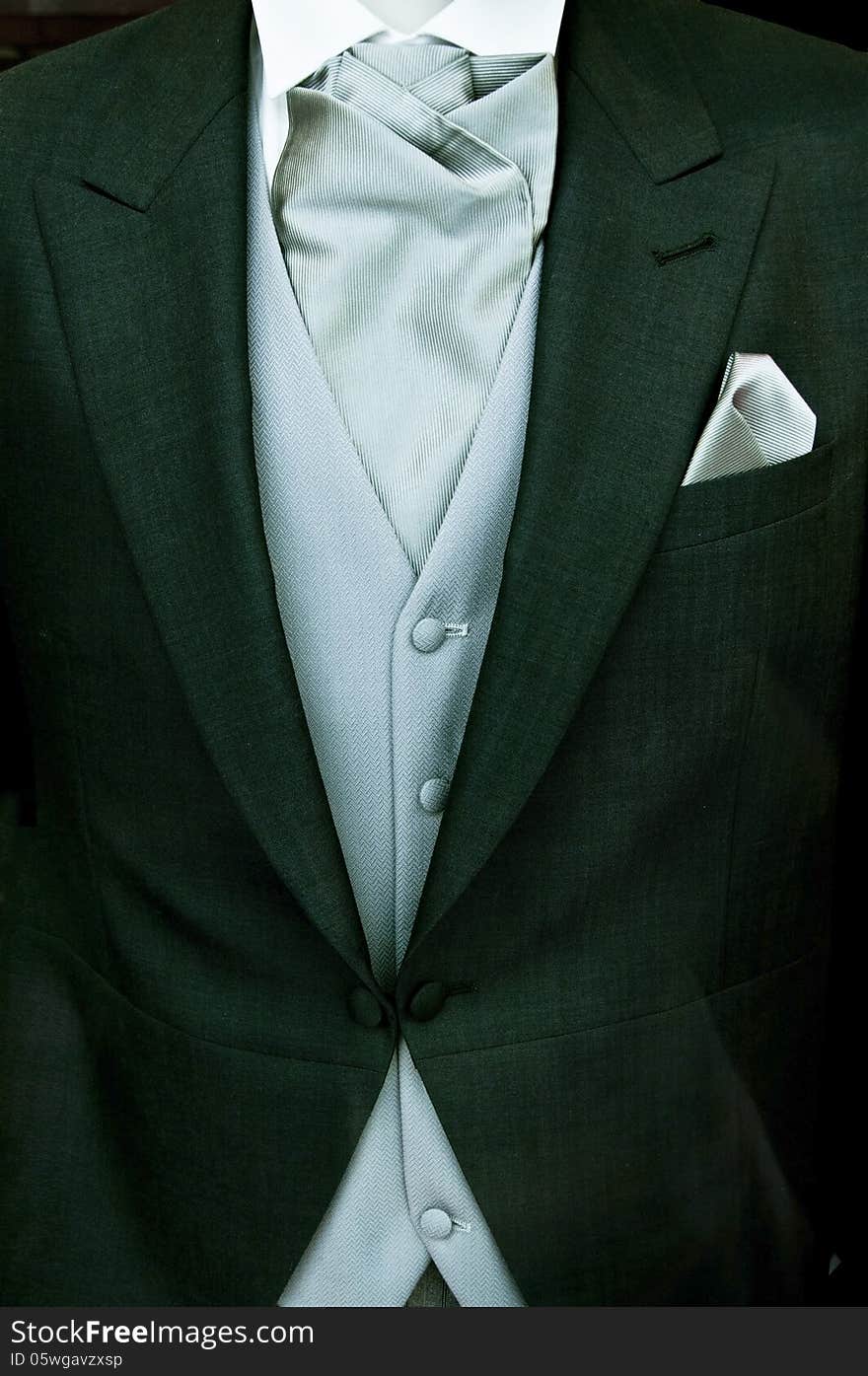 Close up photo of groom's wedding suit. Close up photo of groom's wedding suit