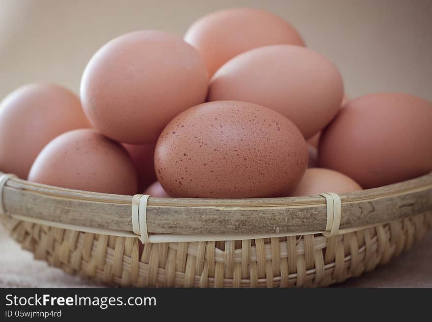 Basket with eggs on sackcloth