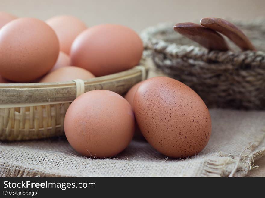 Basket with eggs on sackcloth