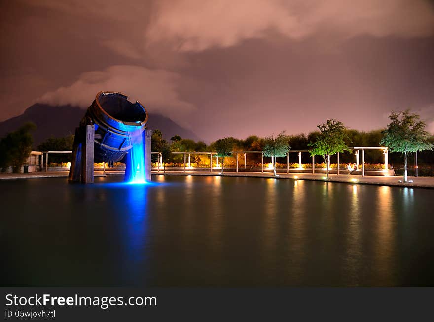 Foundry Tray on an artificial lake and a Mountain in the background