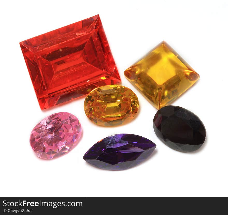 Various color , shape and size of Gemstone on white background