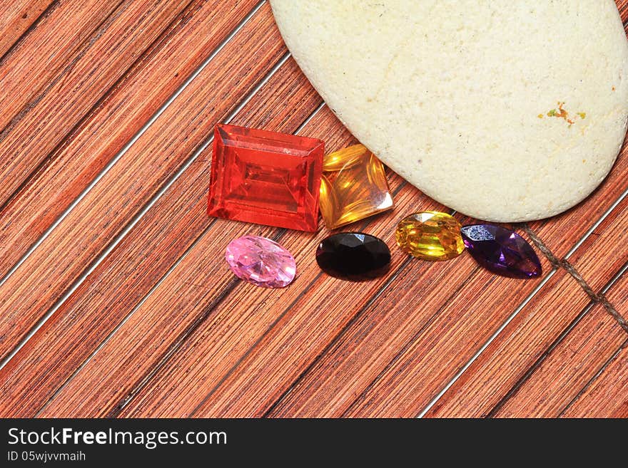 Gemstone On Wood Background