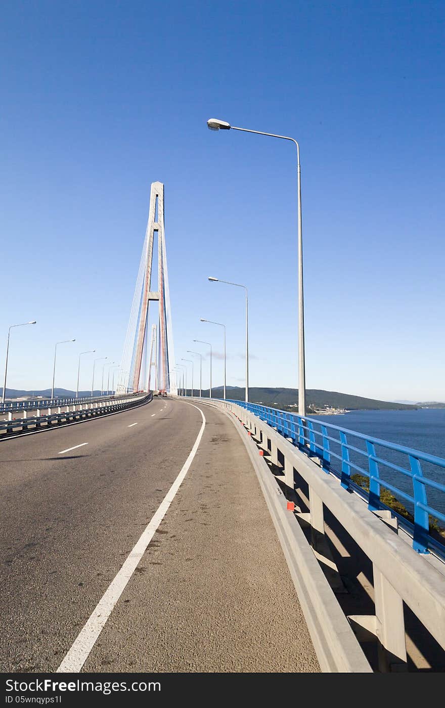 Big suspension bridge in Vladivostok in beams of a bright sun