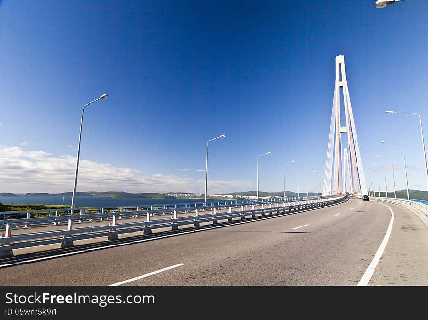 Big suspension bridge in Vladivostok in beams of a bright sun