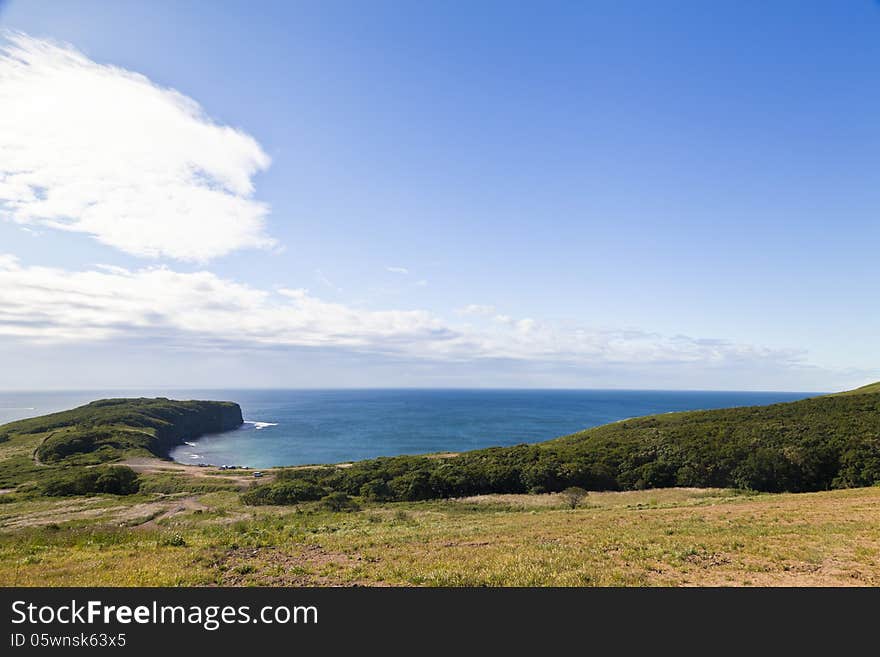 Sea landscape in the bright sunny day under the blue sky