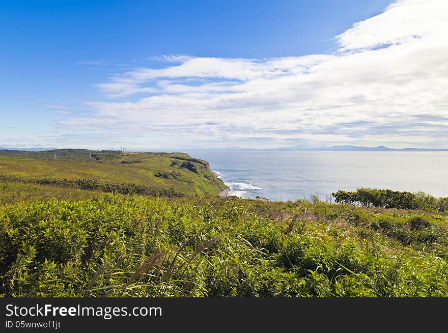 Sea landscape in the bright sunny day under the blue sky