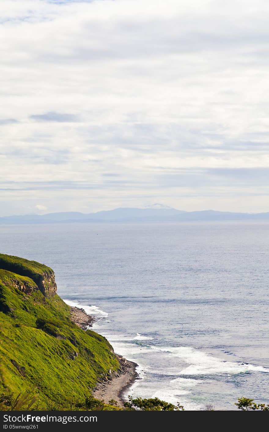 Sea landscape in the bright sunny day under the blue sky