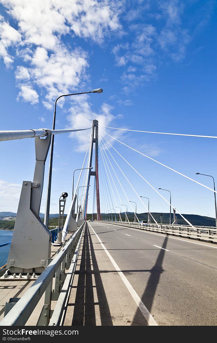 Big suspension bridge in Vladivostok in beams of a bright sun