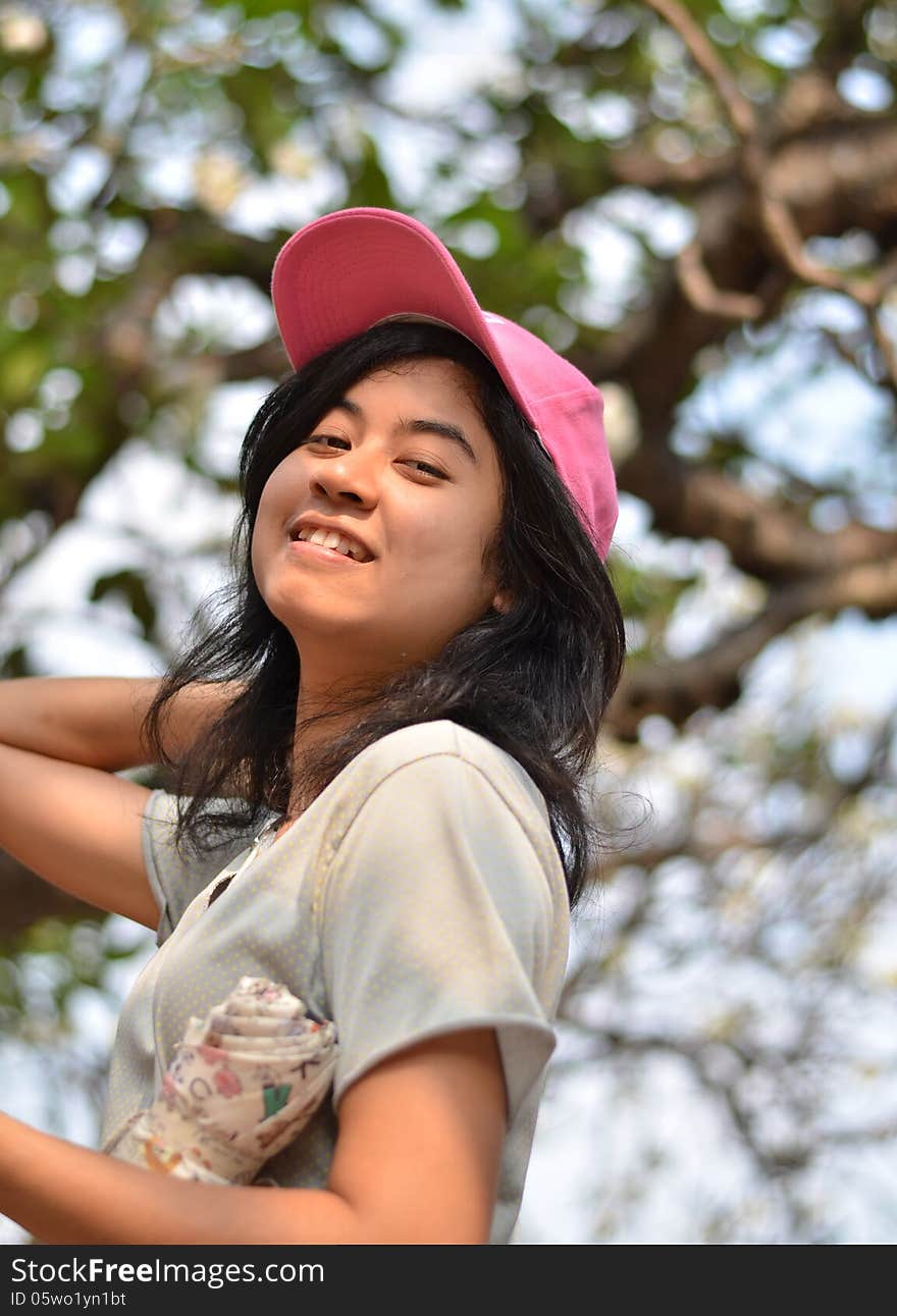 Portrait of a young asian beautiful woman on the nature