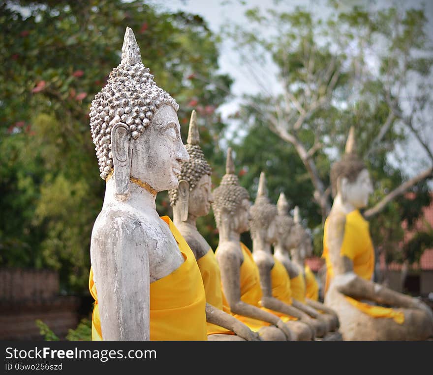 Ancient Buddha statues at Wat Yai Chai Mongkol in Ayutthaya, Thailand