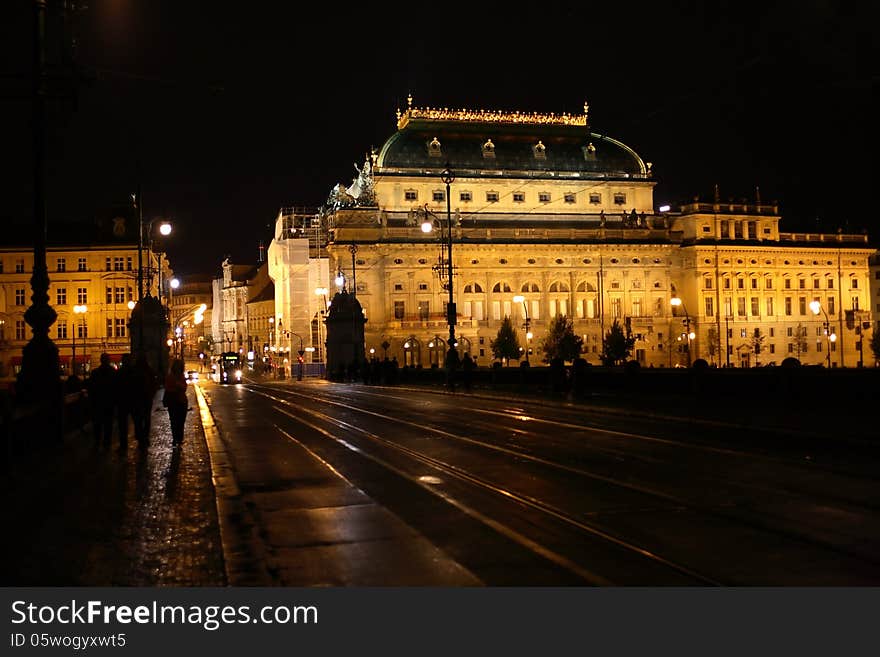 Night urban scene with big alight building. Prague,Czech Republic. Night urban scene with big alight building. Prague,Czech Republic