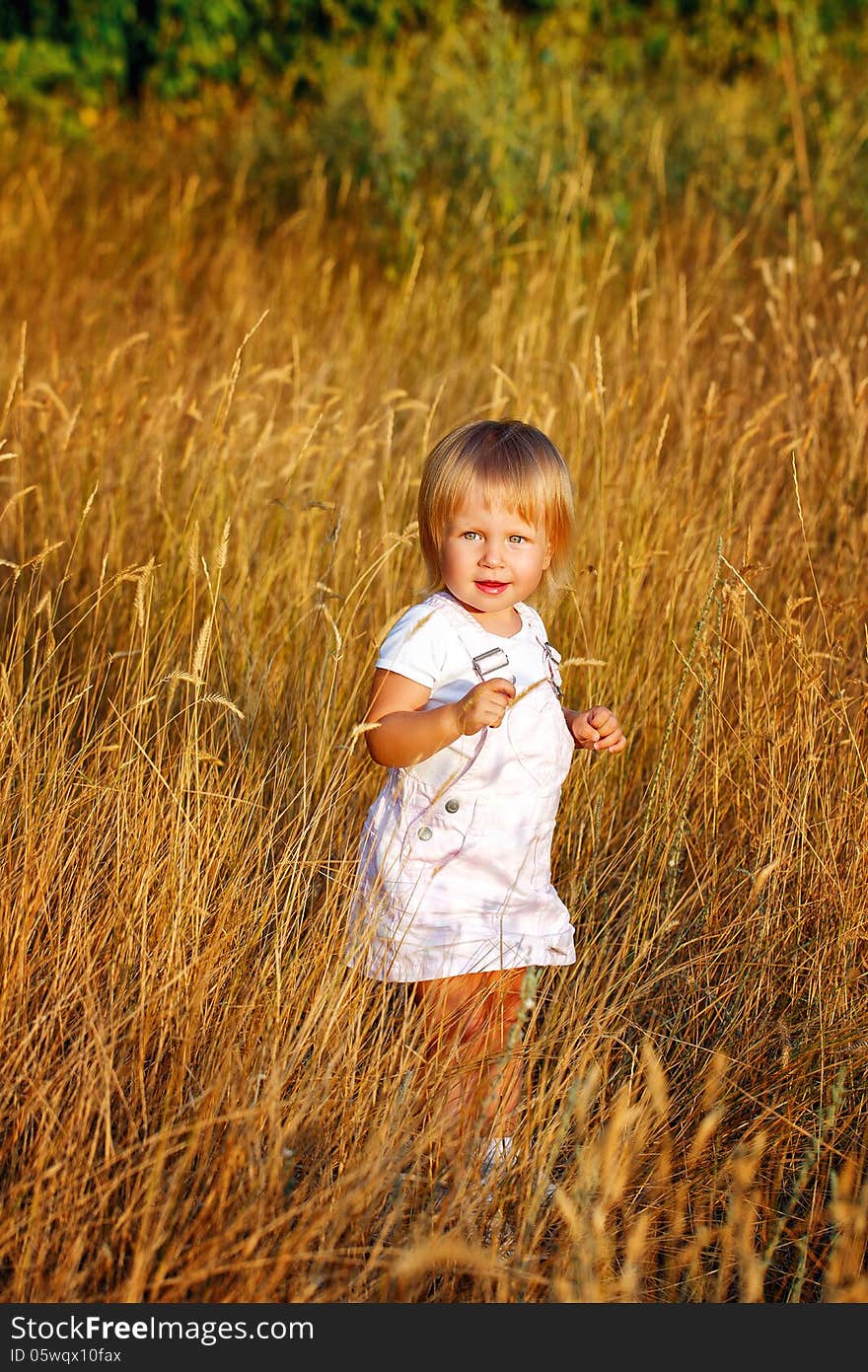 Girl And Wheat Ears