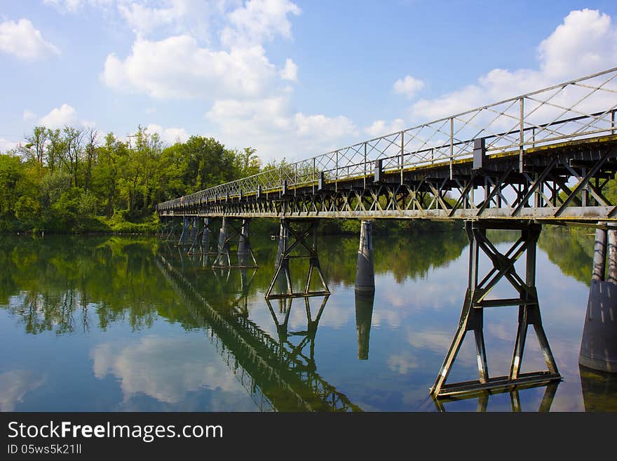 Bridge over calm waters, Fara Gera d'Adda (BG), Italy. Bridge over calm waters, Fara Gera d'Adda (BG), Italy