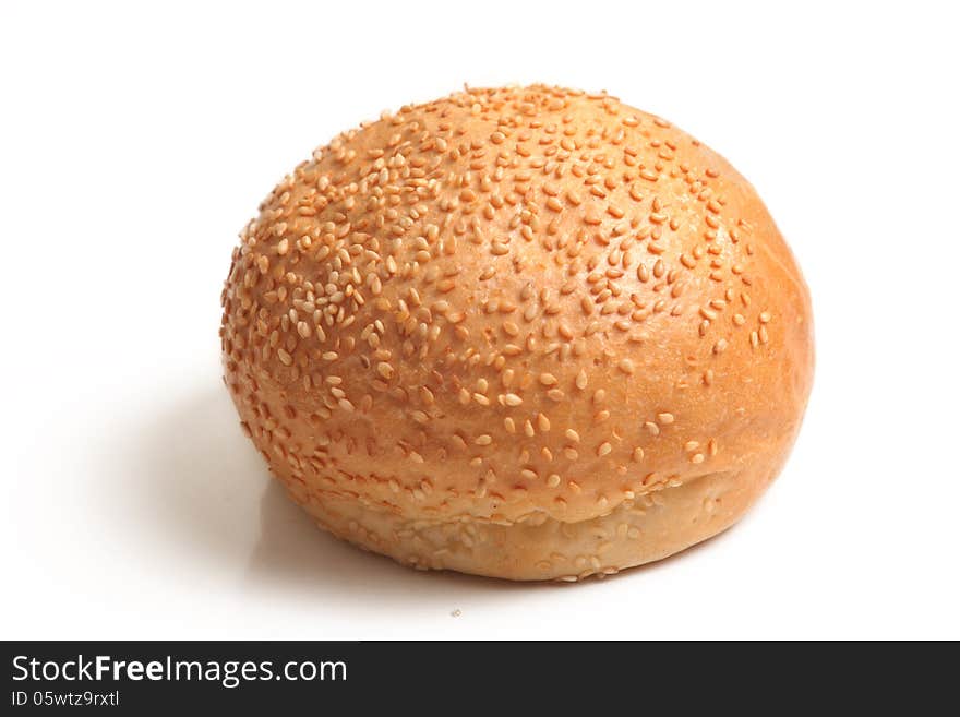 Bread with sesame on a white background. Bread with sesame on a white background