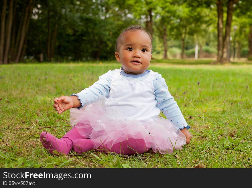 Happy little child is having a nice day in the park. Happy little child is having a nice day in the park