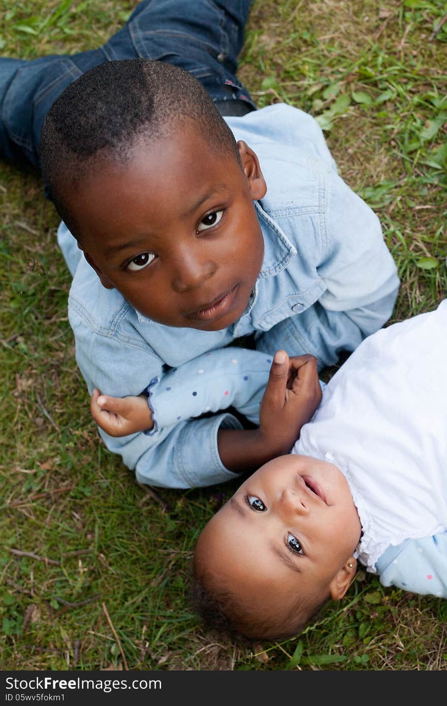 Happy little children are having a nice day in the park. Happy little children are having a nice day in the park