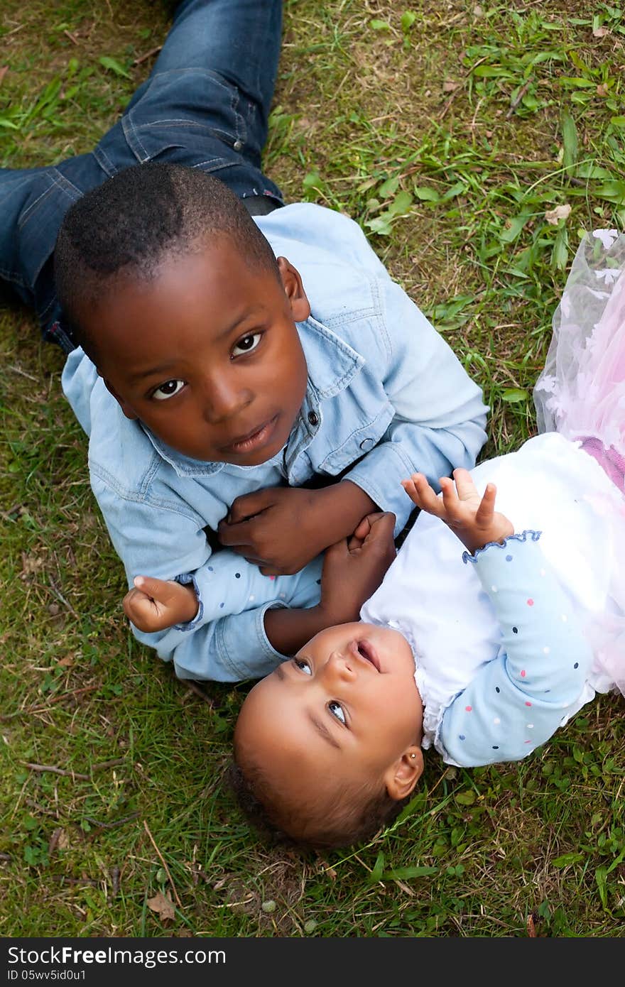 Happy little children are having a nice day in the park. Happy little children are having a nice day in the park