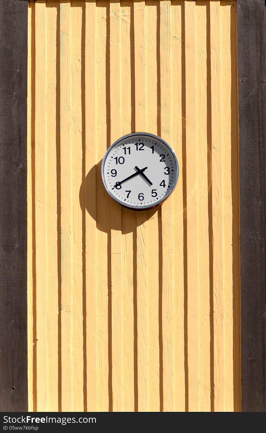 Clock On The Wooden Wall