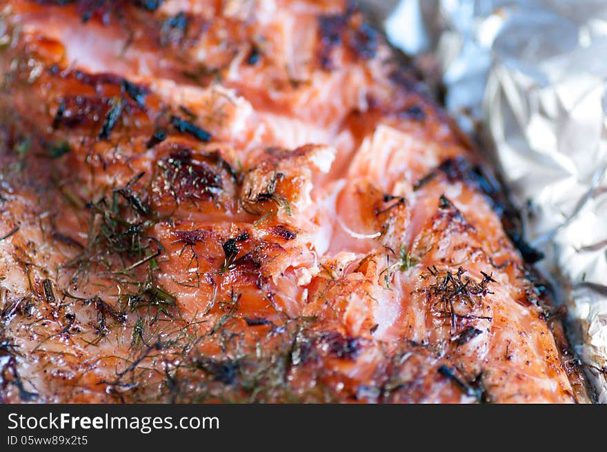 Fish fillet of salmon cooked on coals