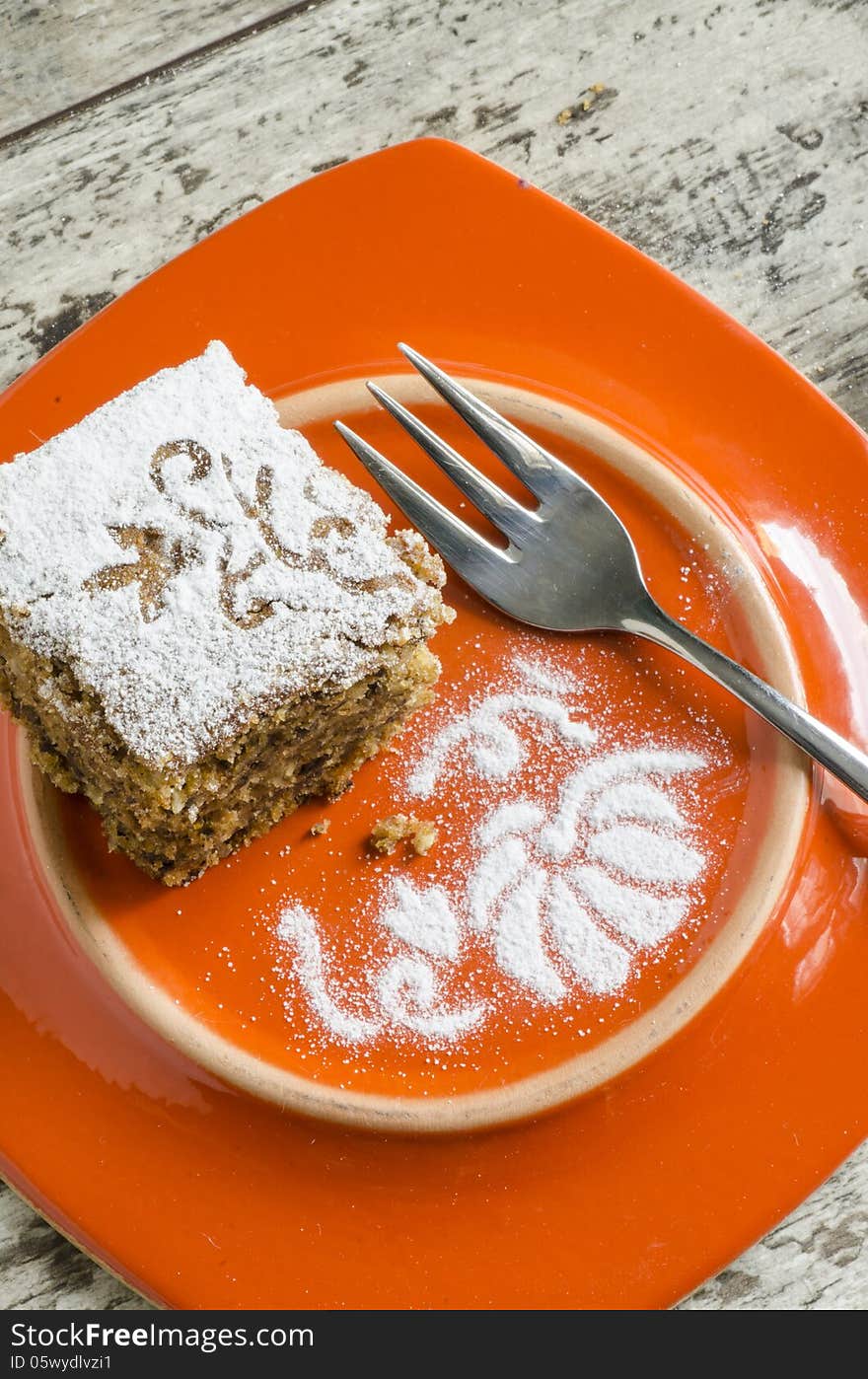 Pumpkin Cake On Orange Plate And Fork